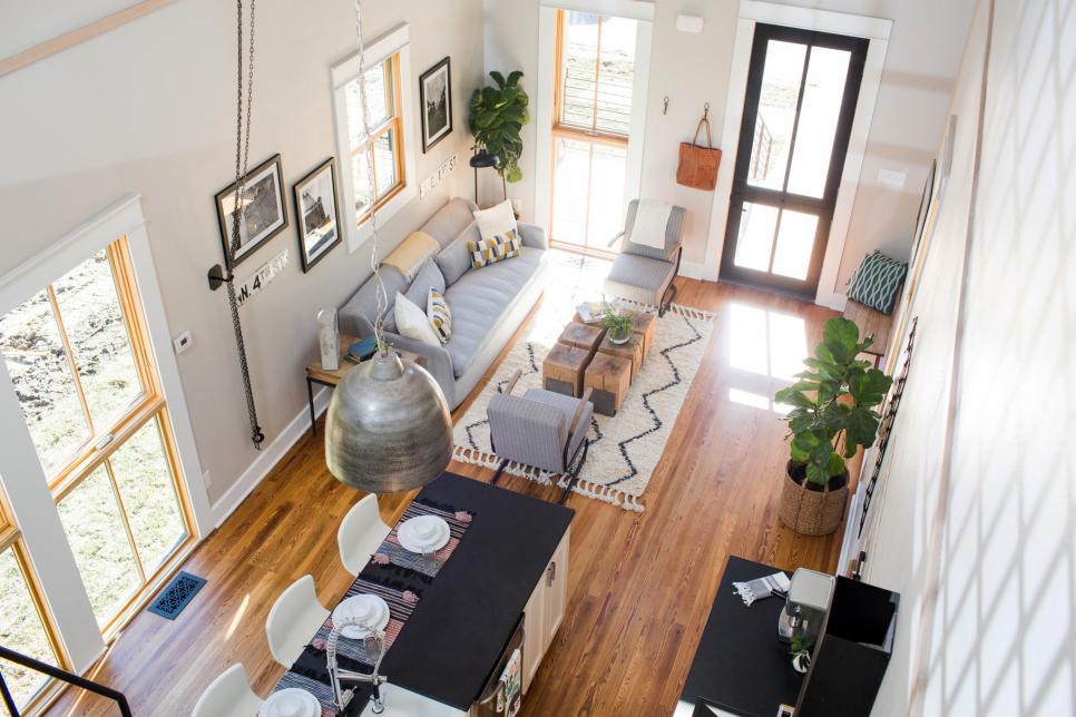 Top view of a tiny home that has a modern design that incorporates white, grey, and black colors.