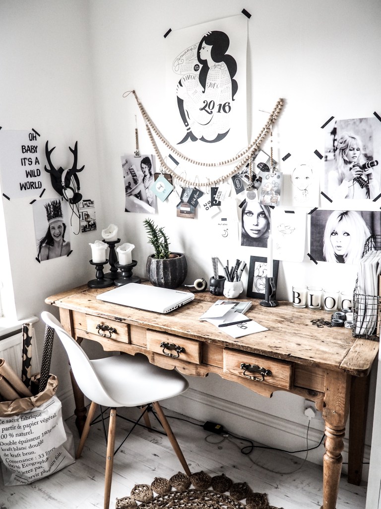 A rustic desk in a dynamic and contemporary styled office