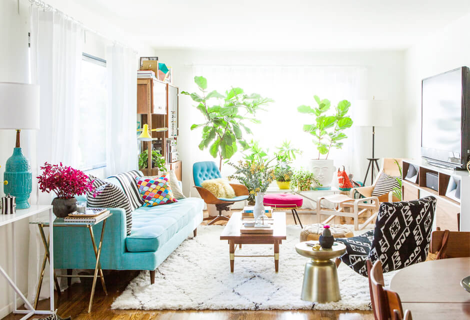 A striking mint sofa in a modern living room