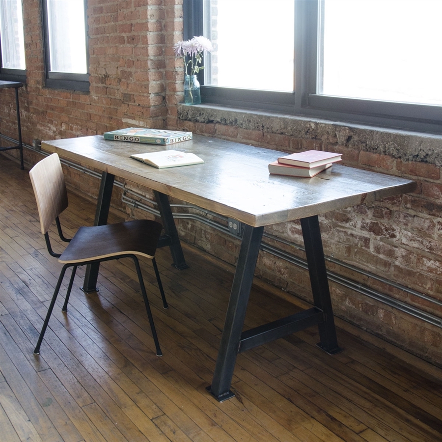 A well-lit office with rustic and industrial decor