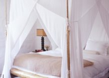Airy-and-seemingly-weightless-four-poster-bed--217x155