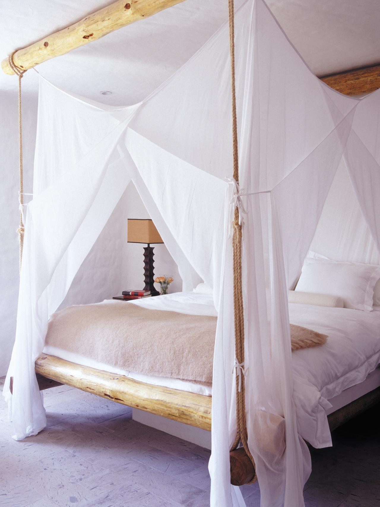 Airy and seemingly weightless four poster bed