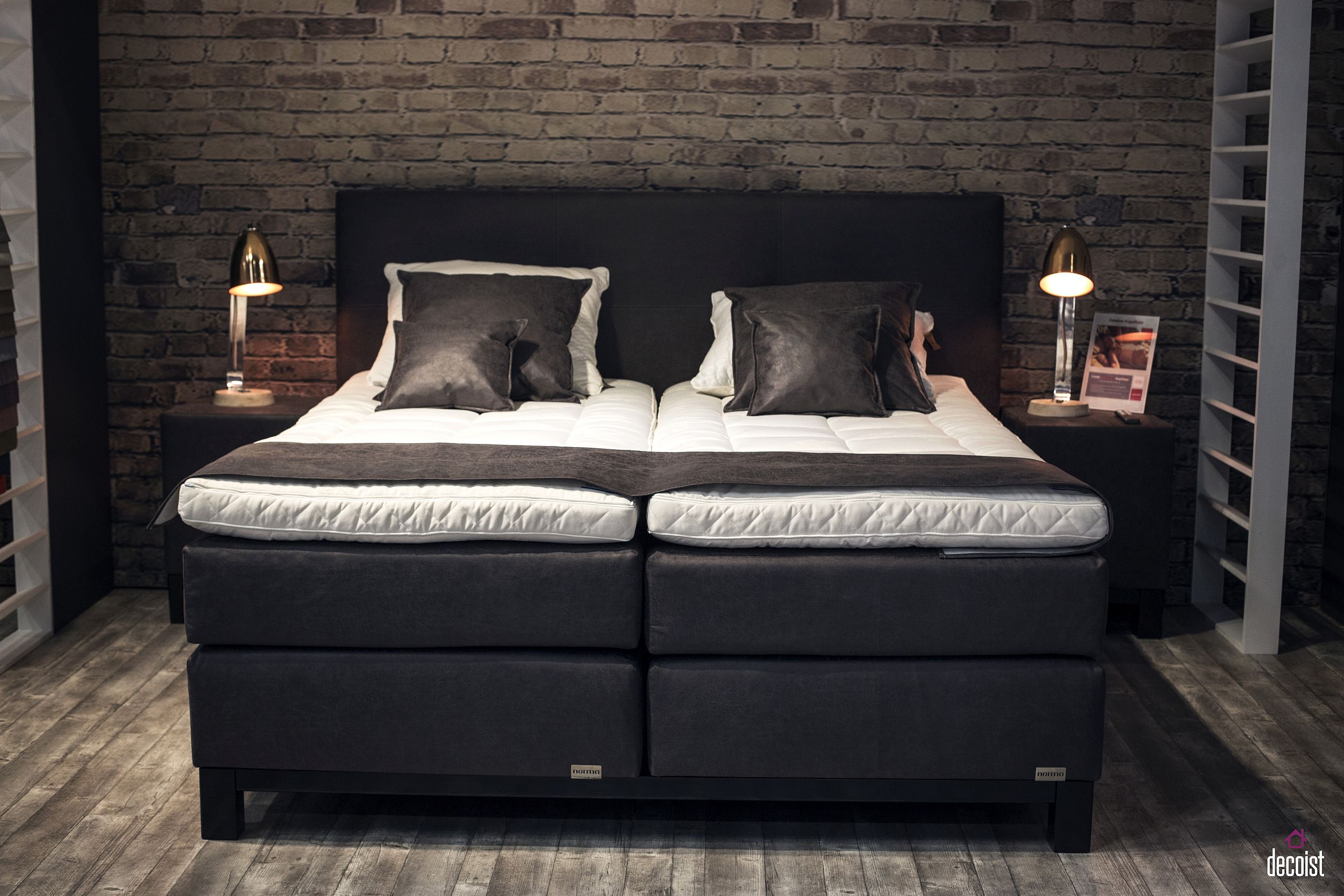 Bed in black anchors the bedroom and creates a cool focal point