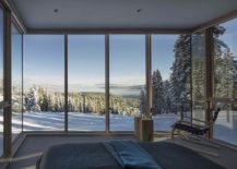 Bedroom-with-glass-walls-offer-gorgeous-view-of-the-snowy-mountain-slopes-217x155