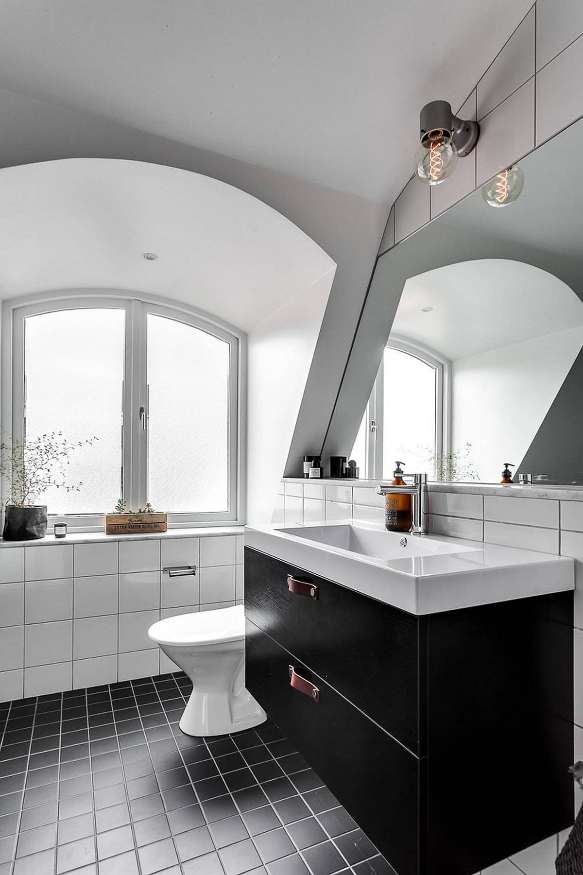 Black and white Scandinavian bathroom with a dash of gray