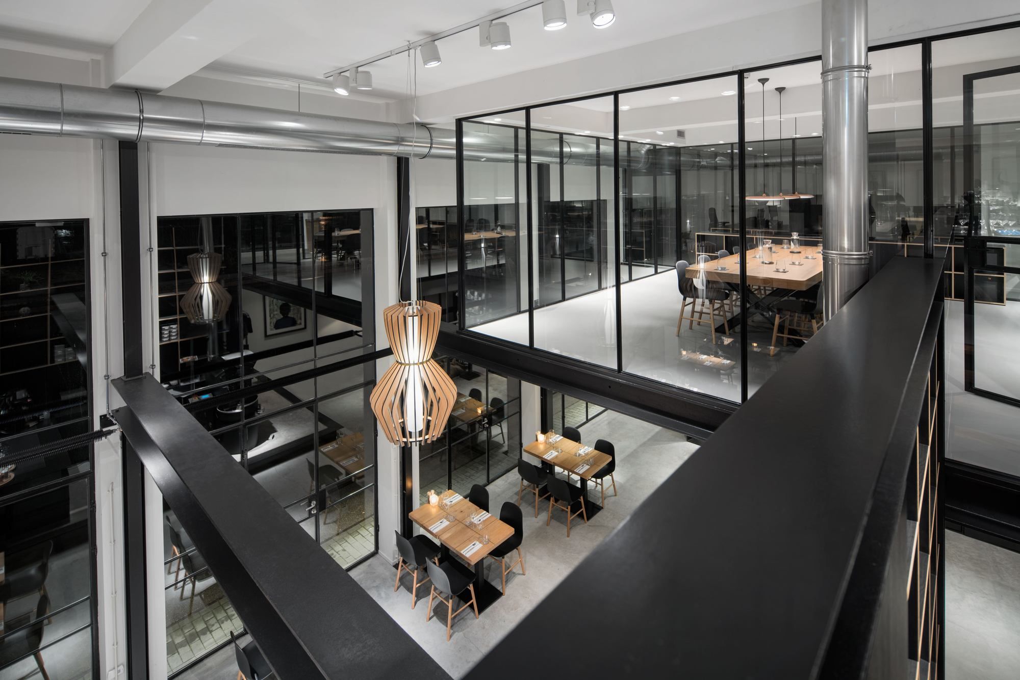 Black and white interior of the industrial cafe in The Hague