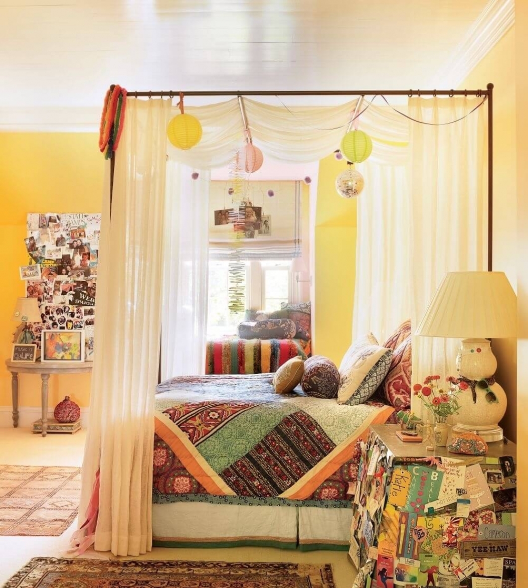 Boho bed with colorful bedding and simplistic white bed frame curtains