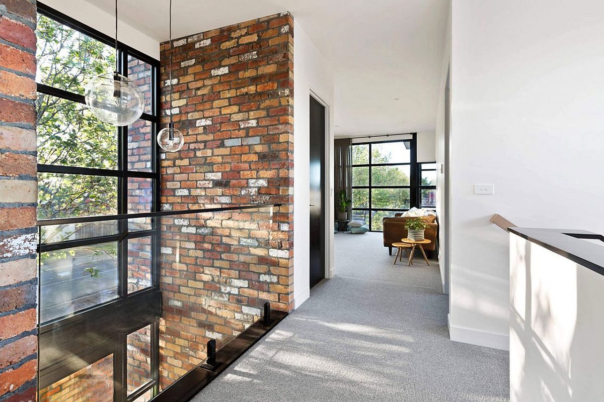 Brick walls give the stairwell a unique appeal