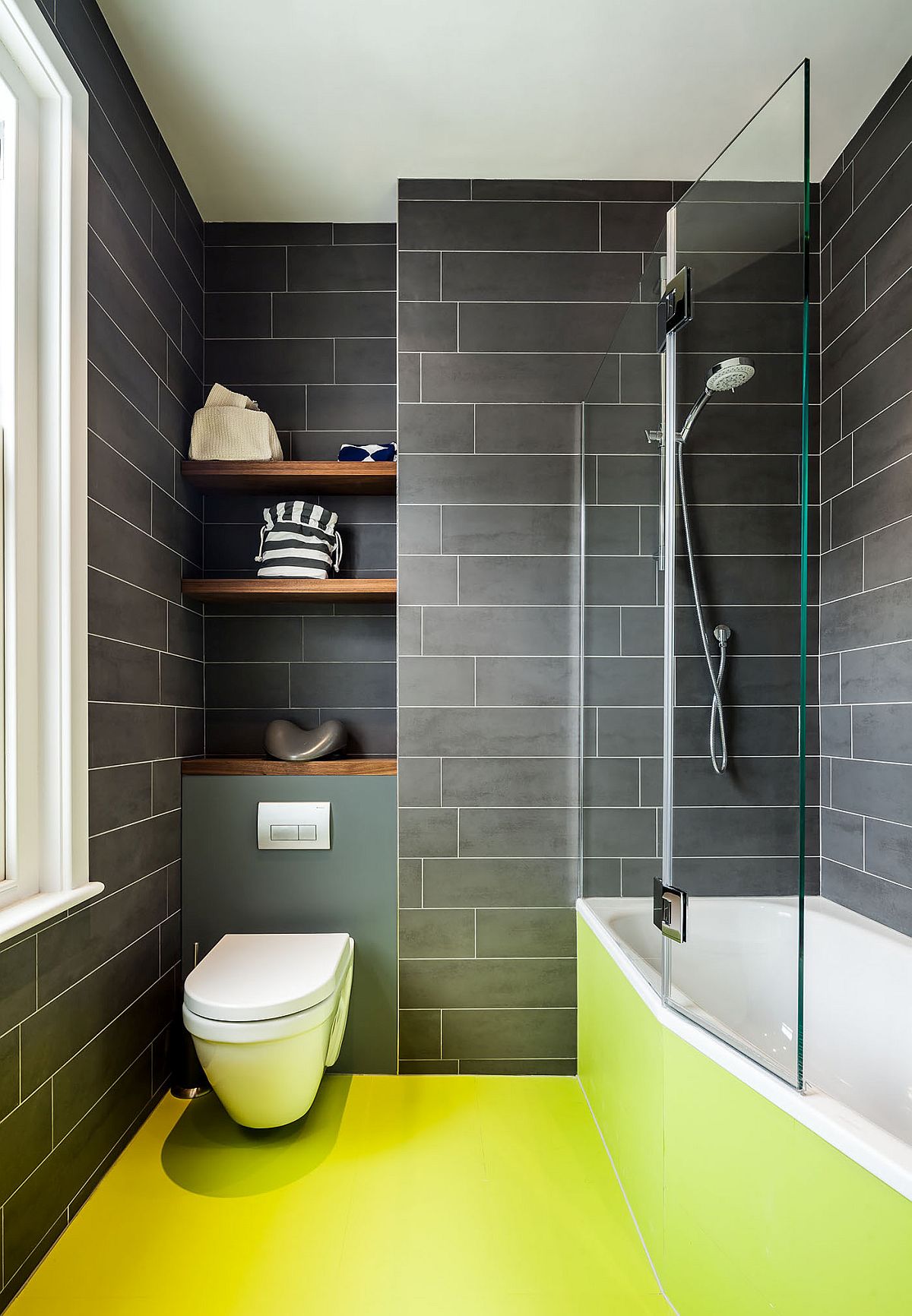Bright and beautiful bathroom in gray and black with yellow flooring
