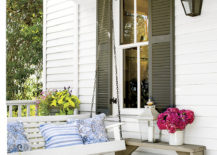Calming-porch-setting-with-a-white-swing--217x155
