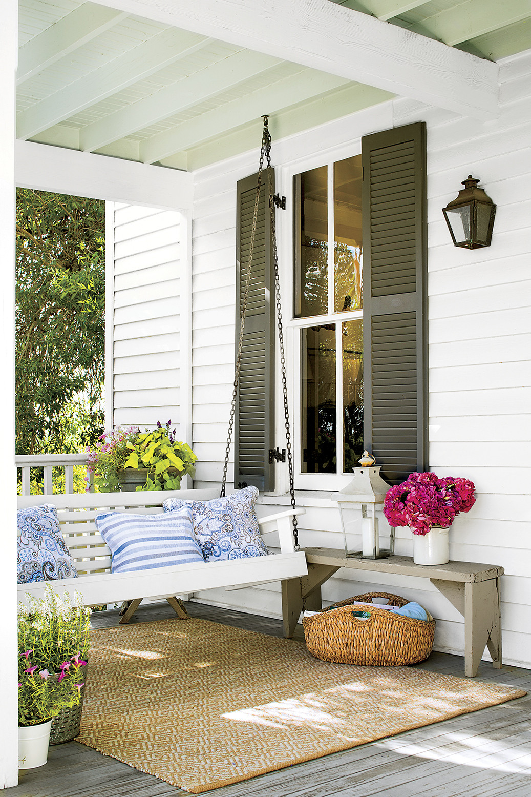 Calming porch setting with a white swing