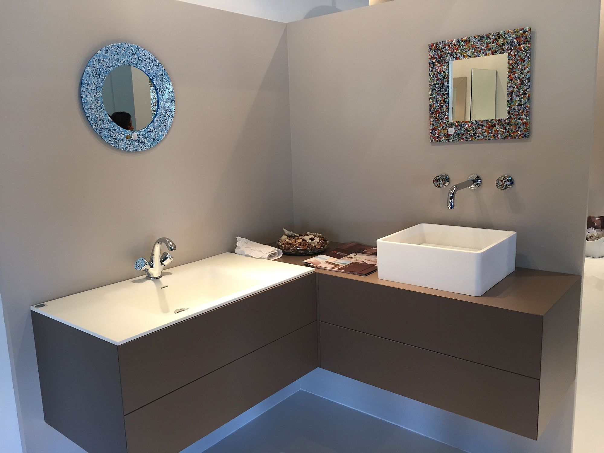 Colorful and invetive mirror frames enliven the contemporary bathroom
