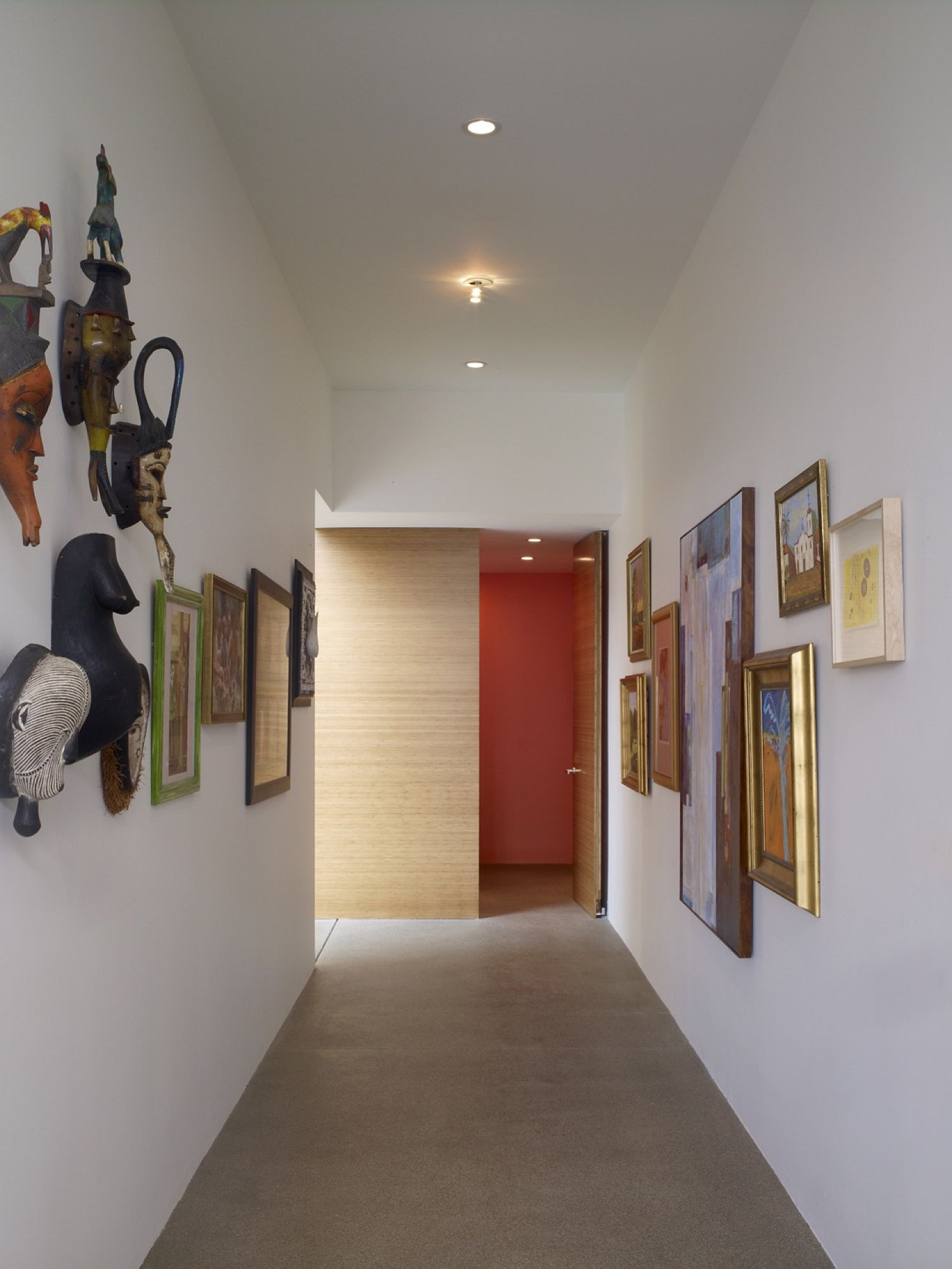 Corridor-turned-into-an-art-gallery-style-setting-using-unique-art-pieces