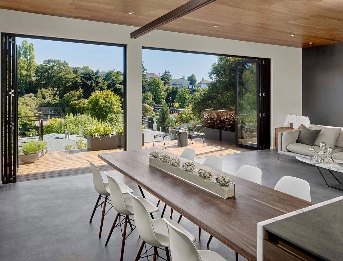 Dining table that is an extension of the marble kitchen island