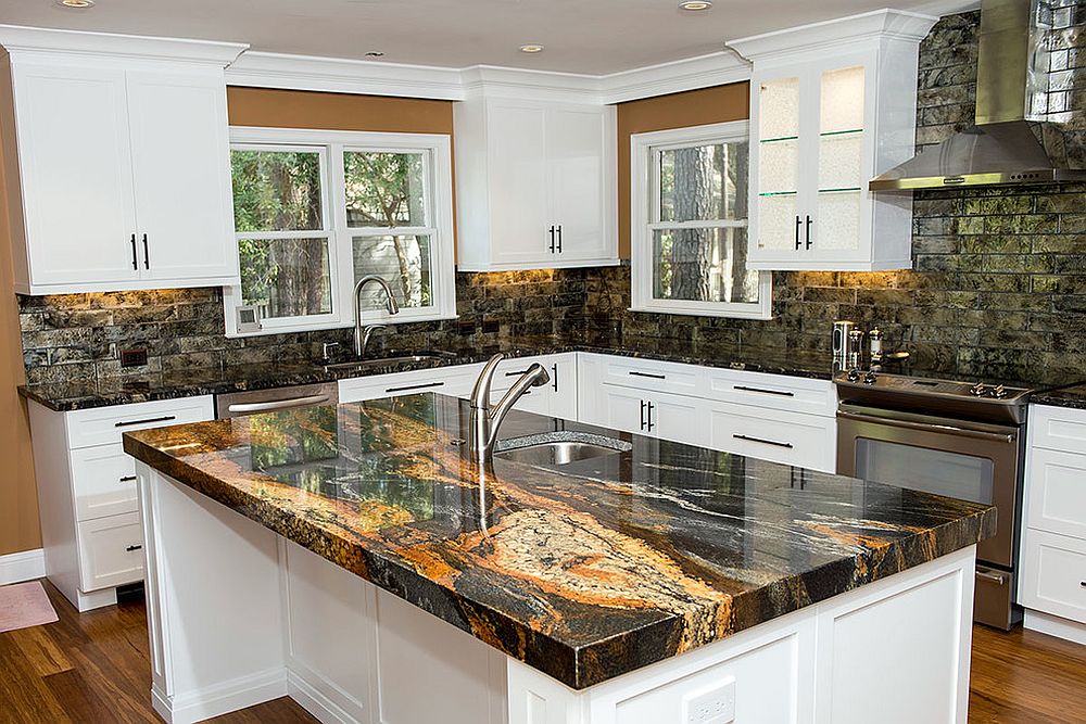 Exotic variant of granite brings color and contrast to the lovely modern kitchen