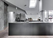 Finish-of-the-walls-and-island-in-gray-gives-the-apartment-a-unique-textural-element-217x155
