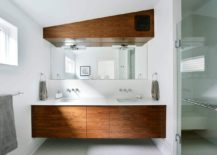 Floating-wooden-vanity-in-the-bathroom-with-a-sparkling-white-coutertop-217x155