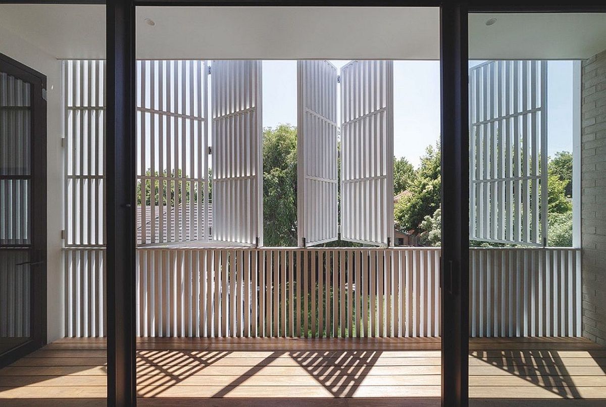 Folding wooden doors on the top level of the Sydney home