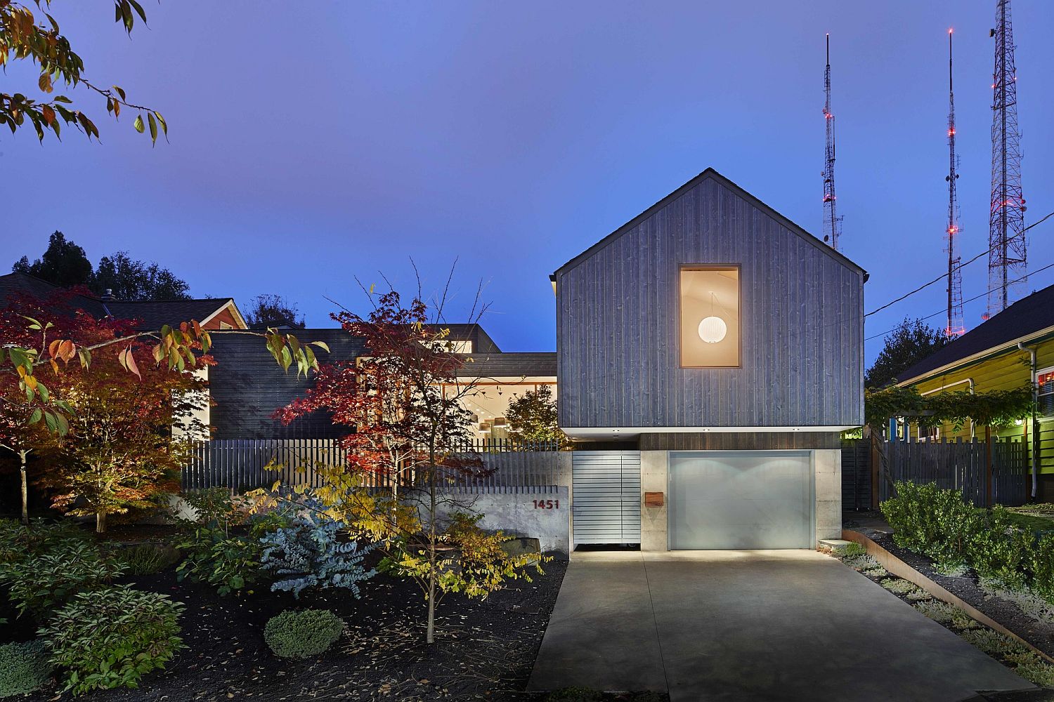 Gable roof of the house allows it to blend in with the neighborhood