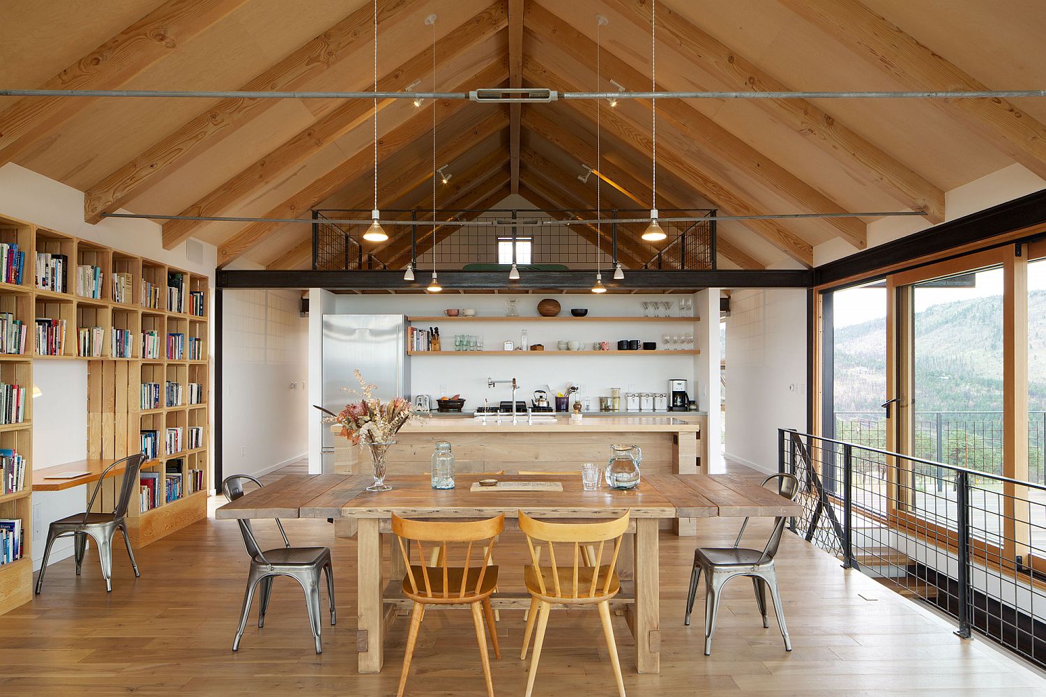 Gabled roof gives the top level living space an open and airy appeal