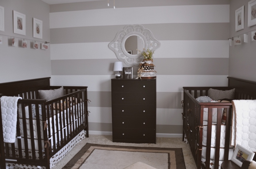 Gender neutral nursery with cream colored walls