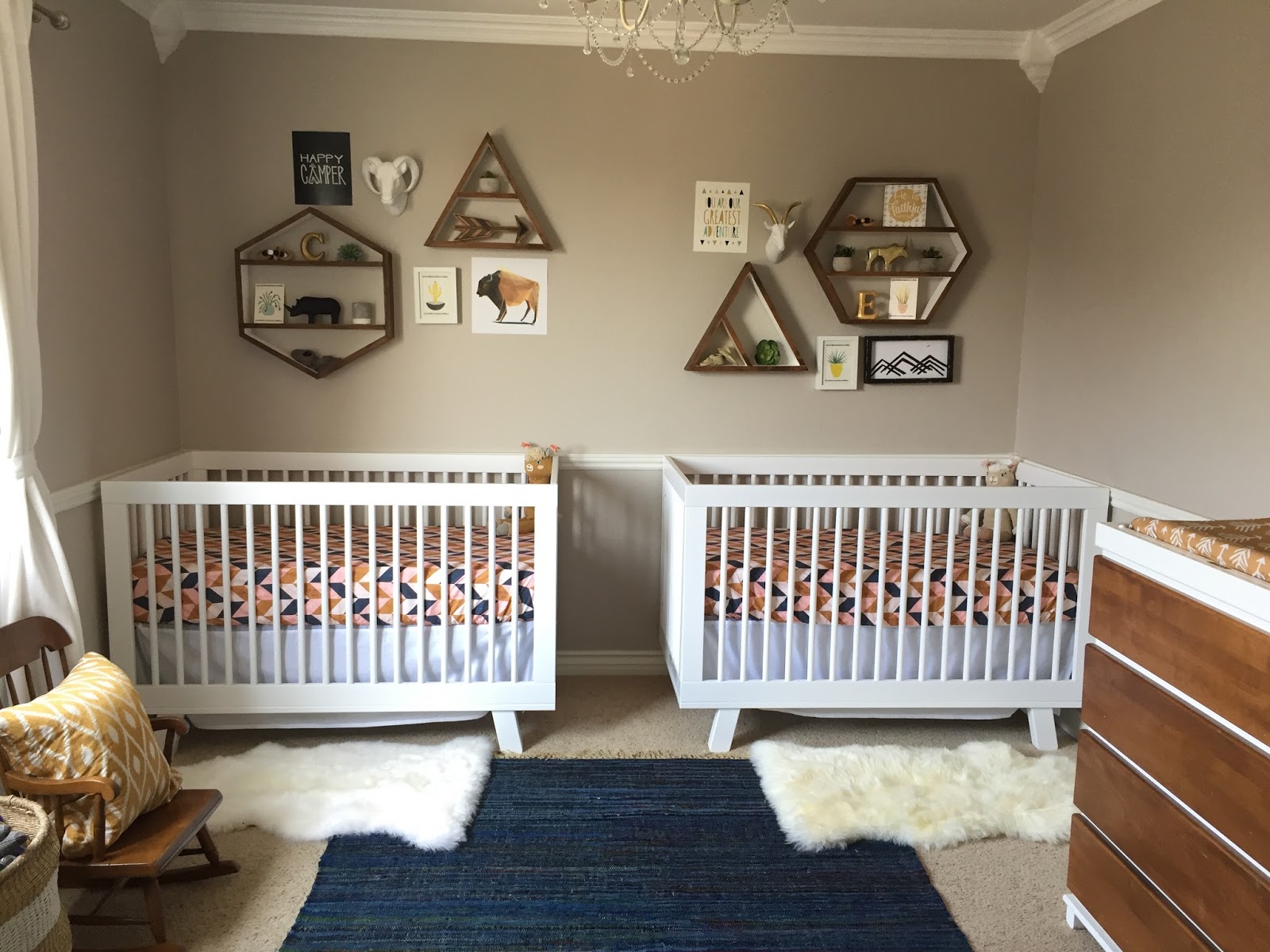 Geometric shelves in a twin nursery