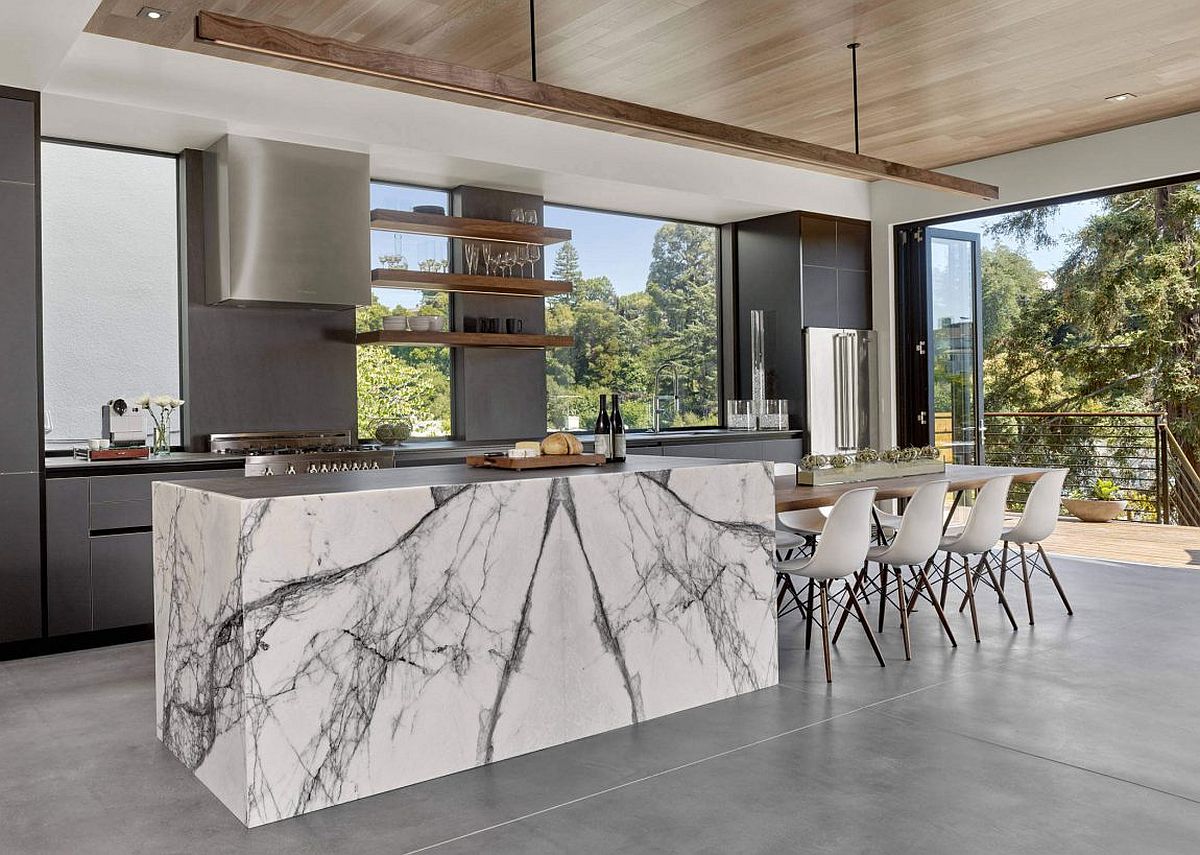 Gray kitchen with a stylish kitchen island that exudes marble sheen