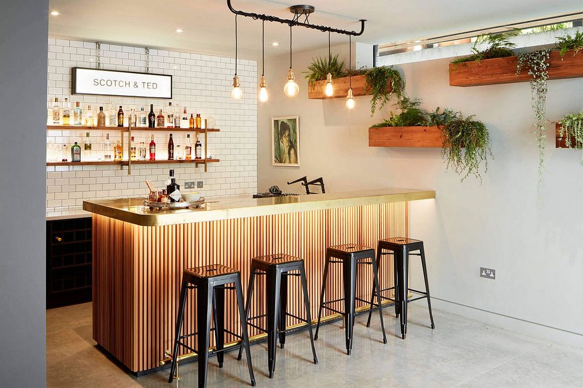 Ingenious home bar with a cool vertical garden and a tiled backsplash