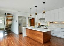 Kitchen-island-in-wood-with-a-polished-countertop-in-white-217x155