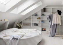 Minimal-attic-bedroom-with-a-round-bed--217x155