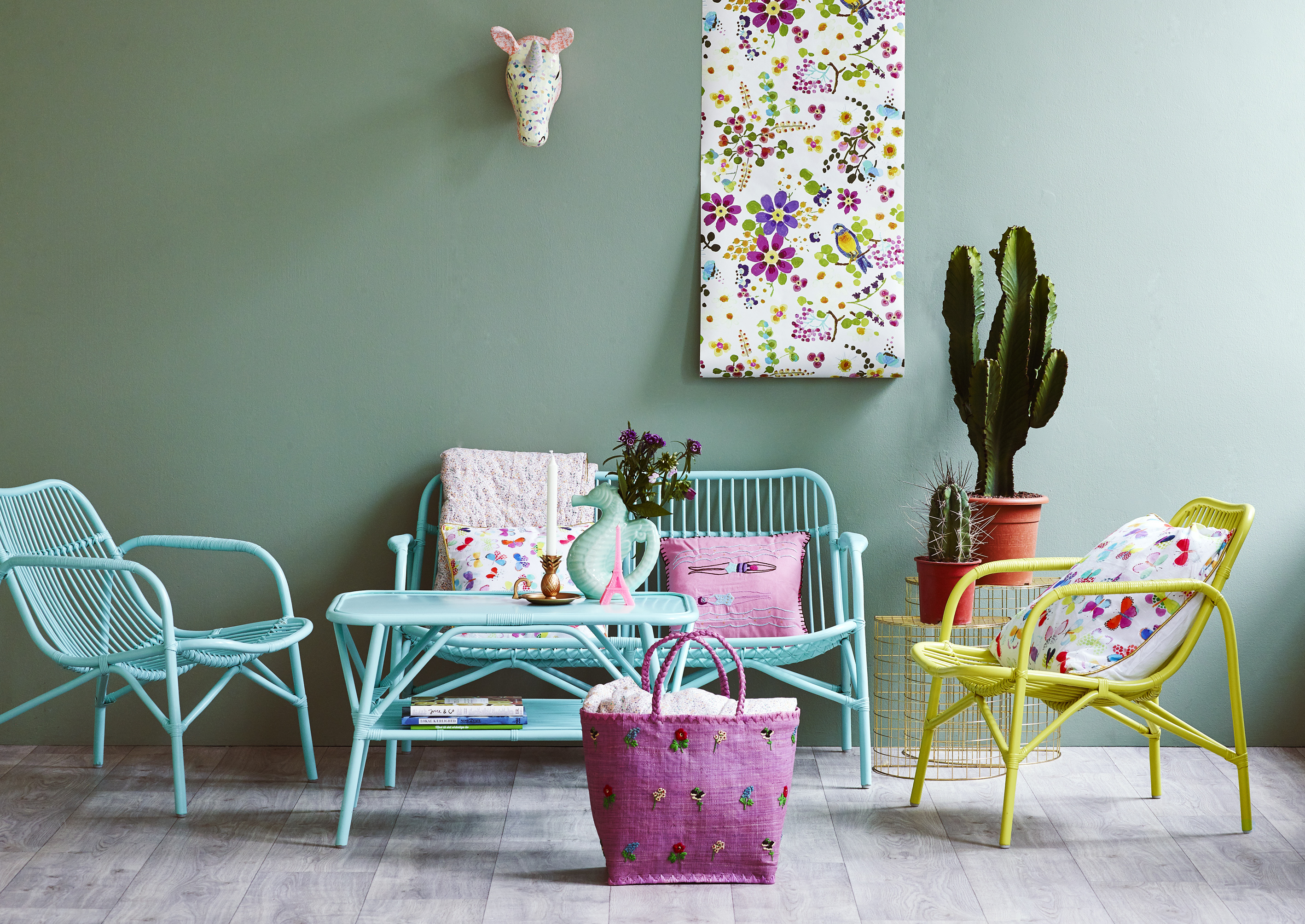 Mint coffee table and chairs in a cozy retro hangout place