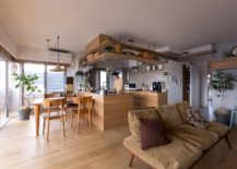 Open-living-area-with-dining-and-corner-kitchen-inside-the-Japanese-home-217x155