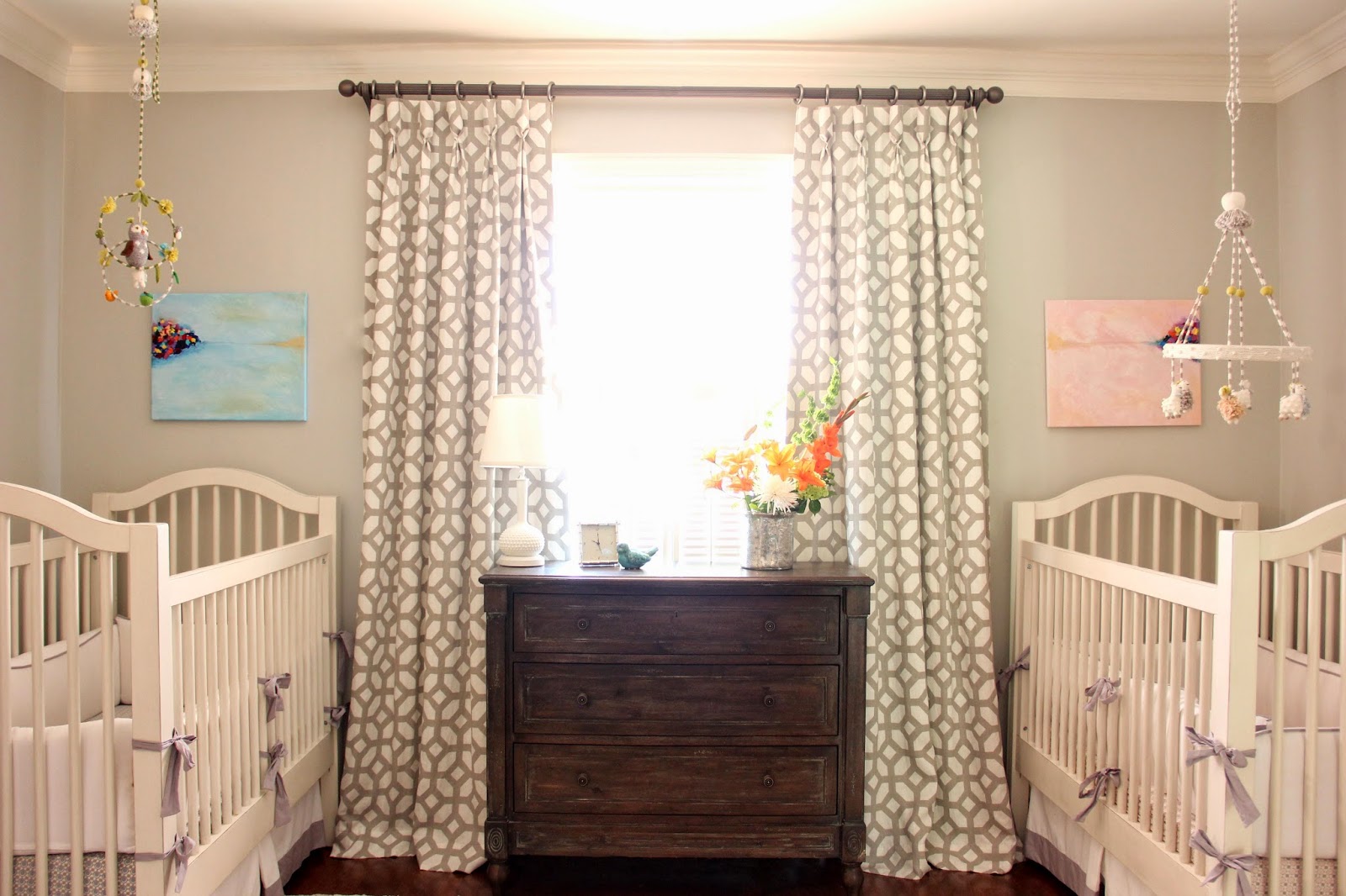 Orderly nursery with a rustic wooden drawer in the center