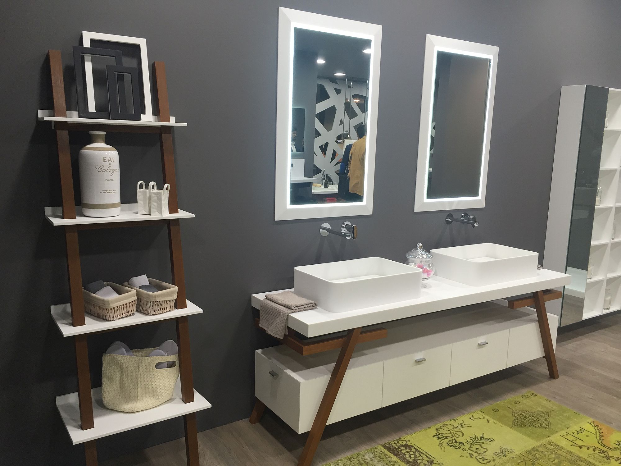 Organized bathroom idea with beautifully lit mirror frames