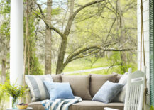 Porch-swing-that-matches-the-trees-and-perfectly-blends-in-with-the-nature-217x155