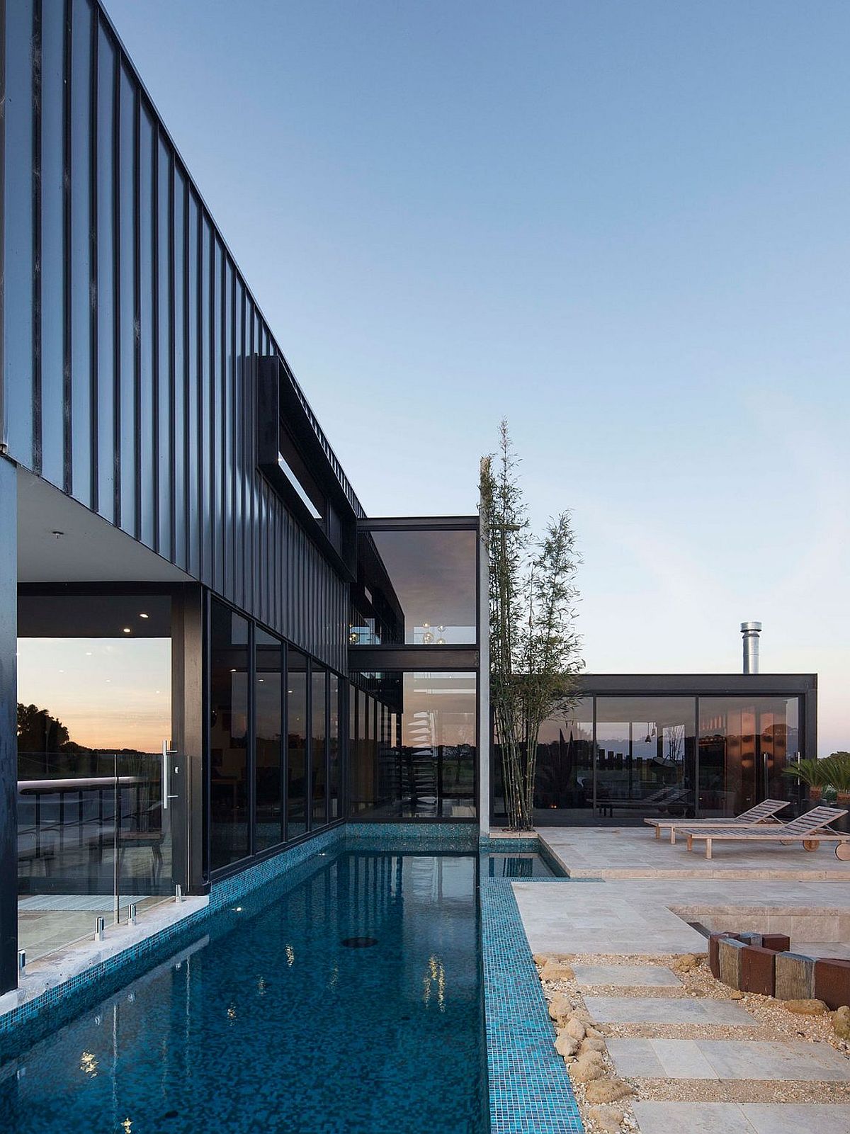 Relaxing lounge and outdoor living space next to the pool