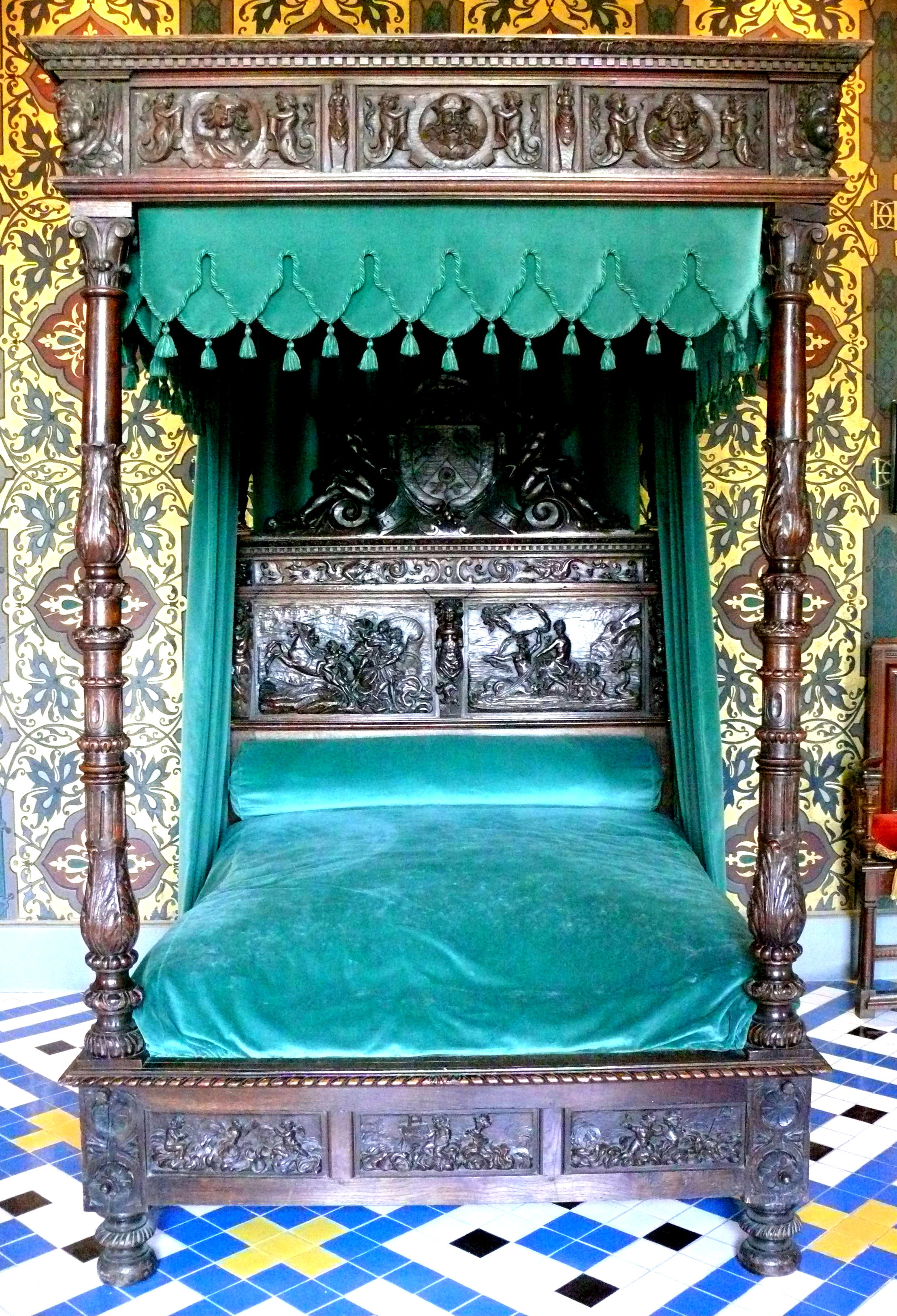 Rustic and vibrantly turquoise four poster bed