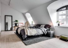 Scandianavian-bedroom-with-large-mirror-ample-natural-light-and-a-relaxing-ambiance-217x155