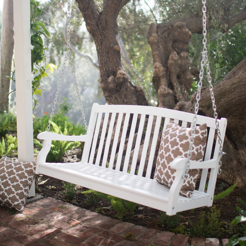 Simple porch swing in a natural landscape