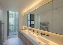 Sleek-and-small-contemporary-bathroom-in-white-and-gray-217x155