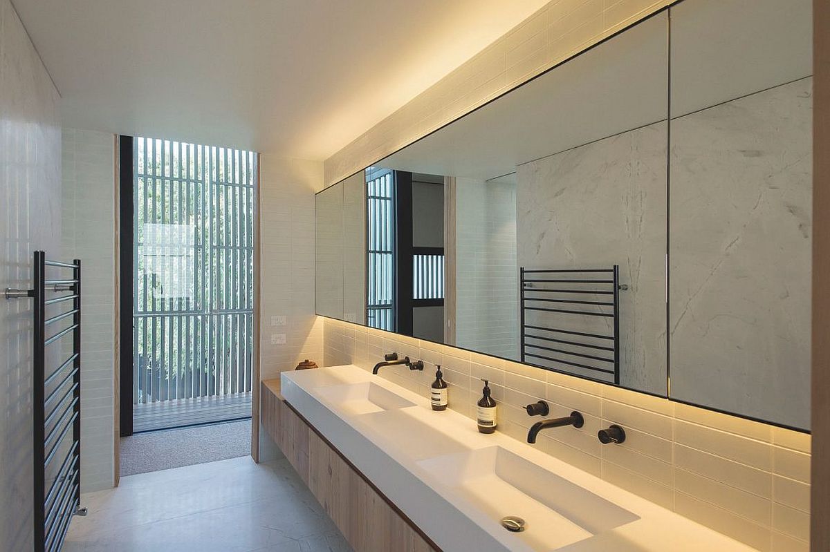 Sleek and small contemporary bathroom in white and gray