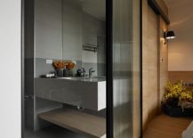 Sliding-trasulucent-glass-doors-connect-the-bathroom-with-the-bedroom-217x155