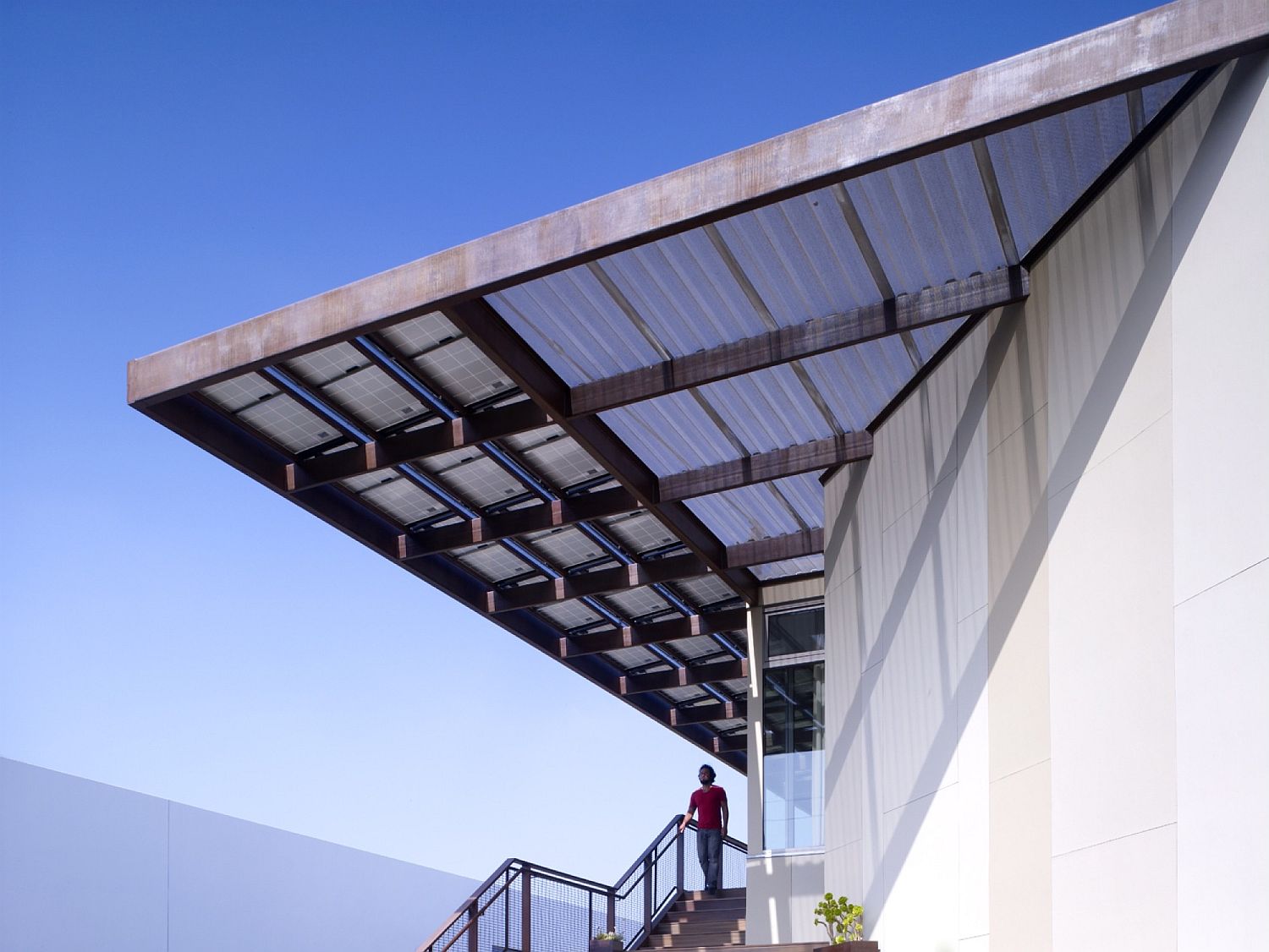 Solar panels offer natural shade even while turning the home into an energy-neutral setting