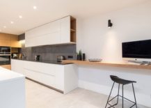 Spacious-kitchen-with-home-workspace-next-to-it-217x155