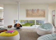 Stylish-contemporary-fireplace-in-white-matches-with-the-color-scheme-of-the-contemporary-living-room-217x155