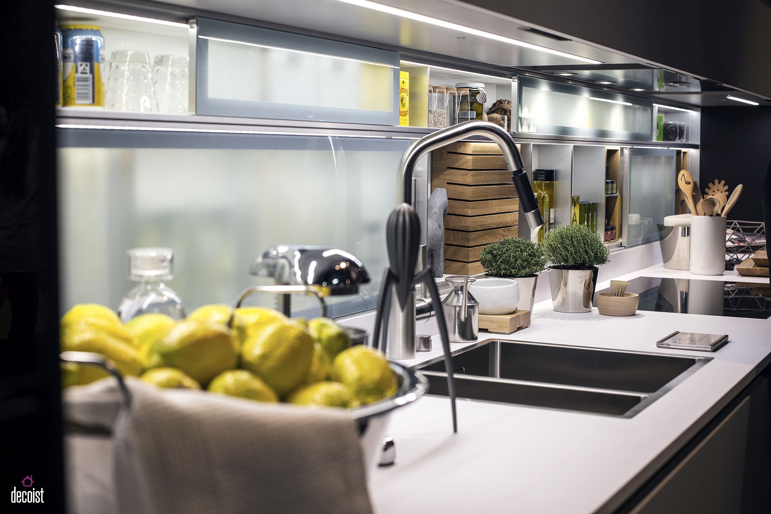 Translucent glass doors bring visual lightness and organizational ease to the small kitchen