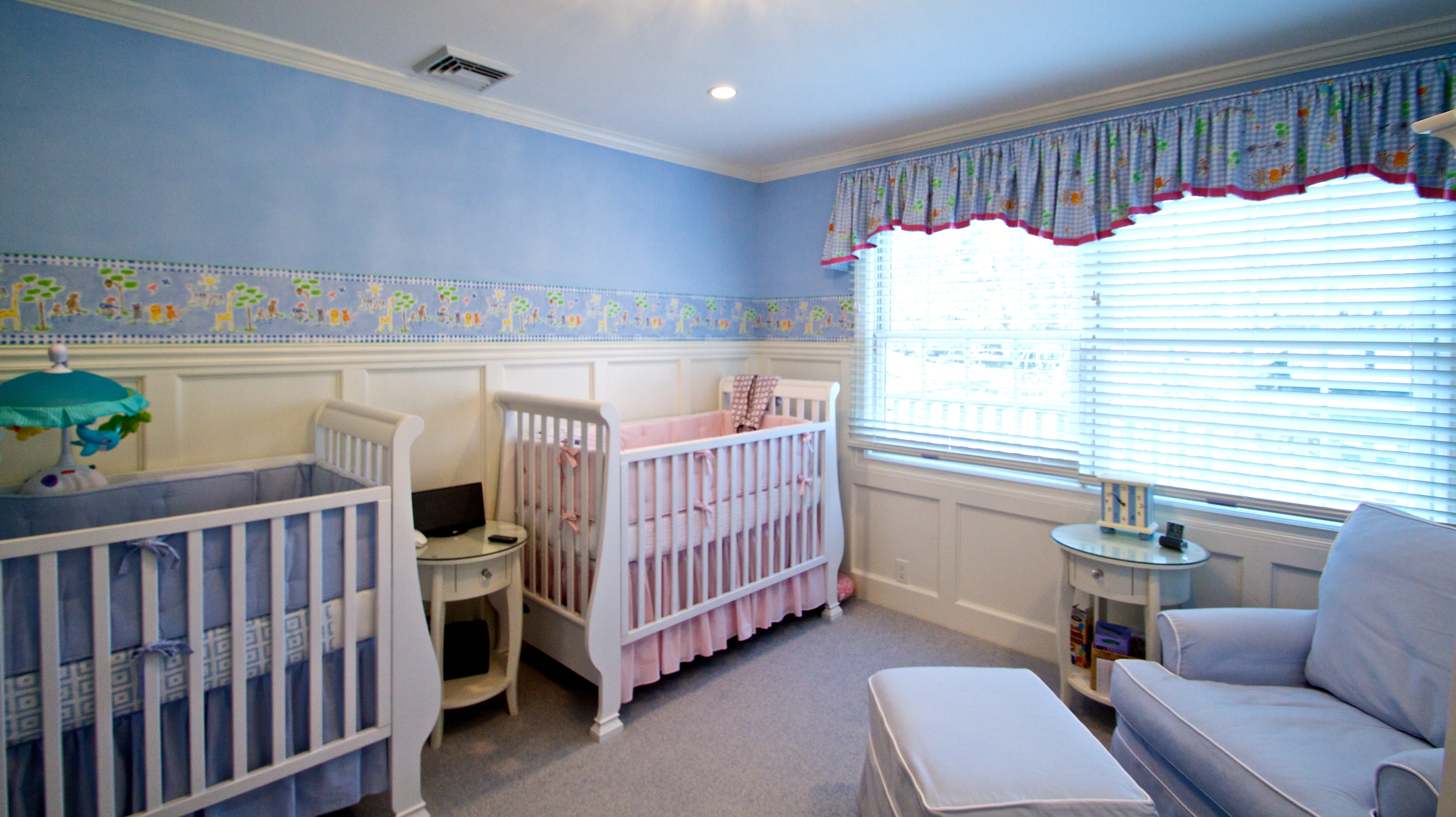 Twin nursery for a boy and a girl