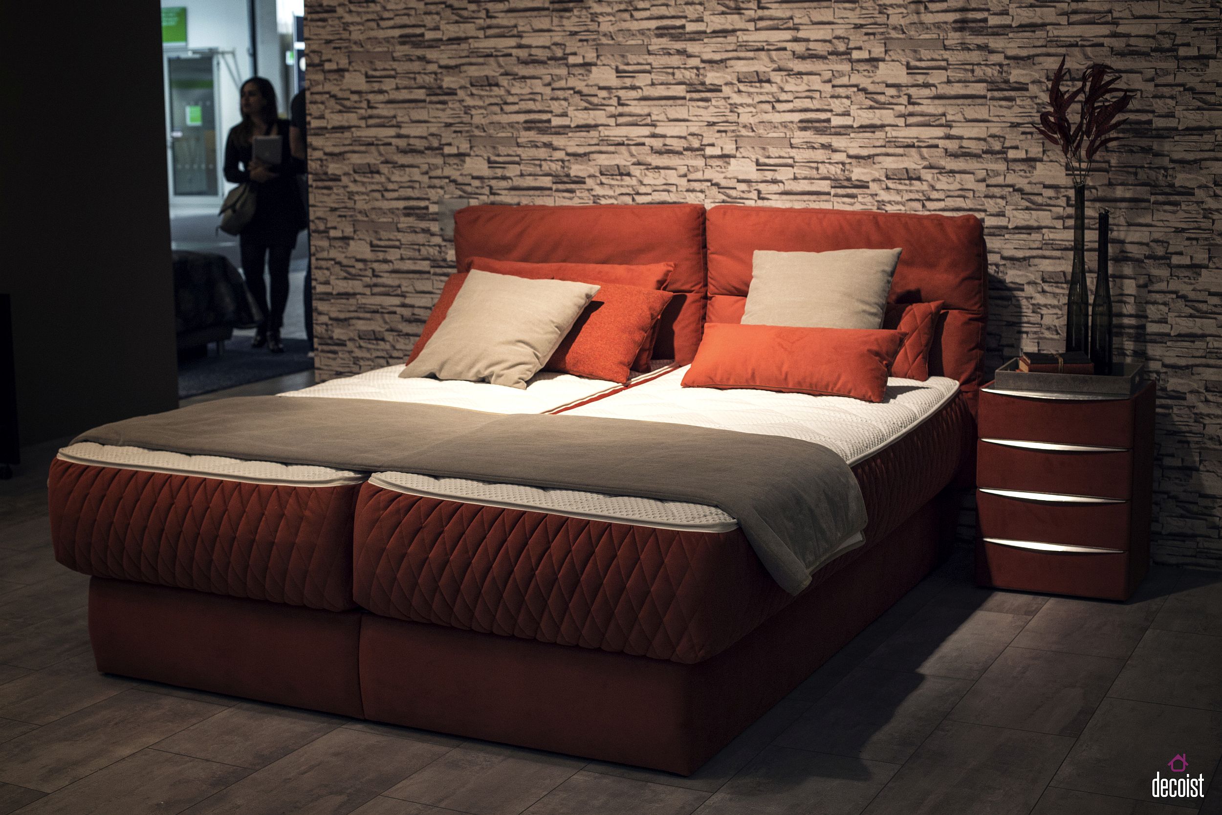 Uber-comfy contemporary bed design with low frame and brick red vibe