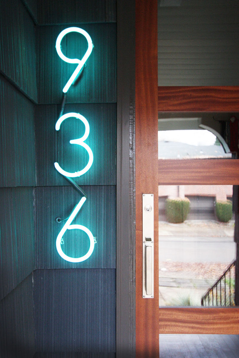 Welcoming neon house number