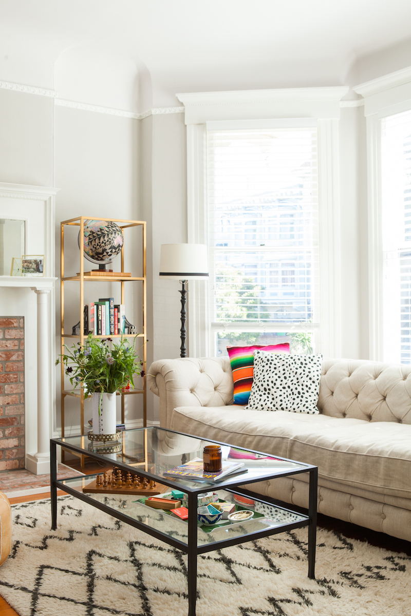 A glass table with a neutral frame as a mixture between conservative and youthful interior